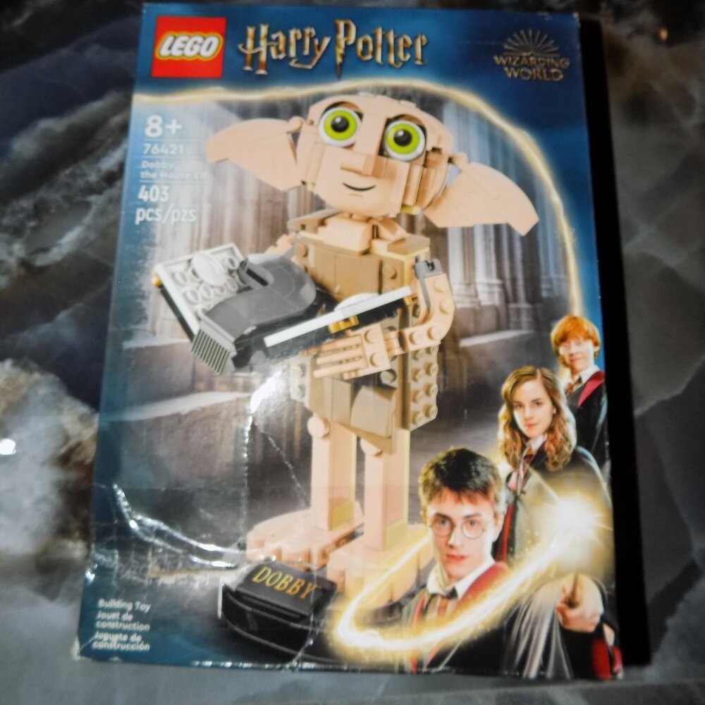 2023 LEGO 76421 HARRY POTTER DOBBY THE HOUSE ELF 403 PIECES BOX IS DAMAGED NEW